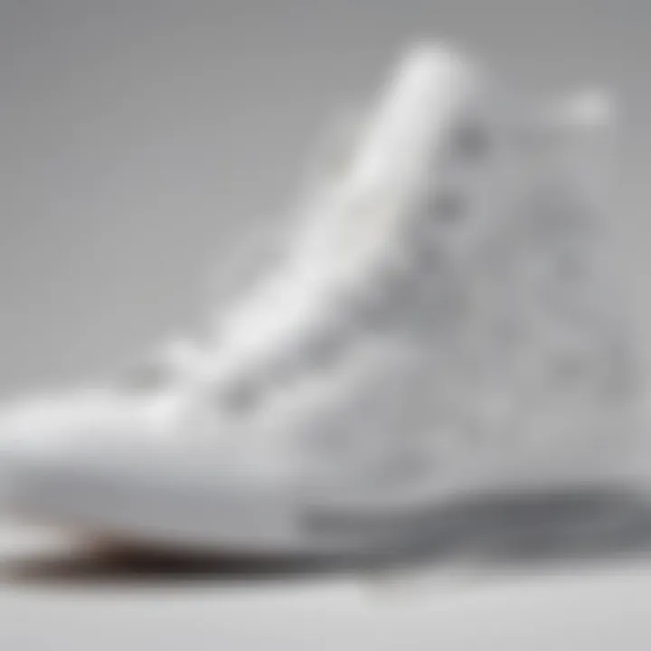 Close-up of all-white Converse shoes showcasing intricate design details