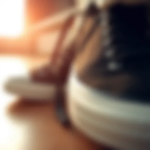 A close-up of black canvas Chuck Taylors showcasing their classic design.