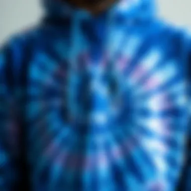 Close-up of the intricate tie dye patterns on a blue hoodie.