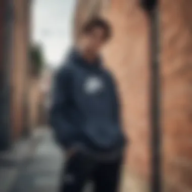 Skateboarder wearing a Nike pull over sweatshirt in an urban setting