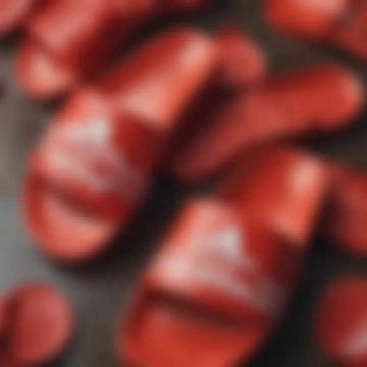 Adidas Adilette Slides in vibrant red showcasing design details