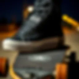 A stylish pair of black Converse platform shoes on a skateboard.