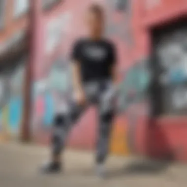 Artistic shot of tie dye sweatpants against a graffiti backdrop