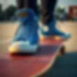 Close-up of blue chucks on skateboard