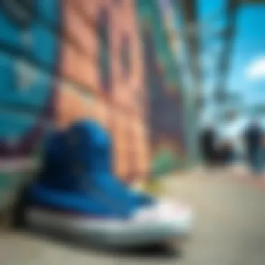 Graffiti wall with blue chucks in foreground