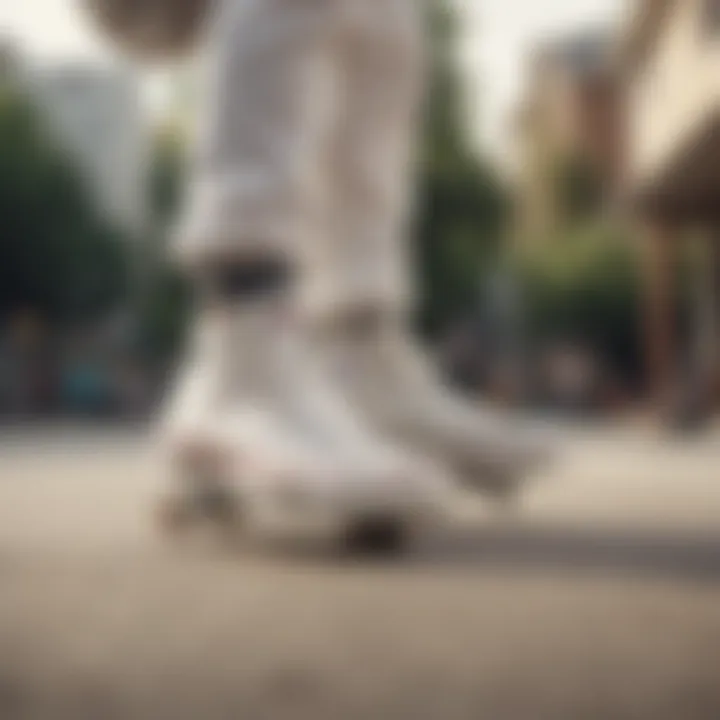 Skateboarder wearing Converse white high tops while performing a trick