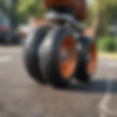 Close-up of cruiser skateboard wheels on pavement