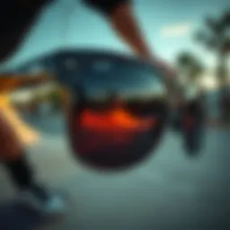 Close-up view of dark flatter sunglasses reflecting a skate park