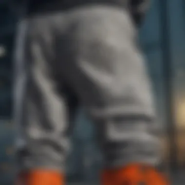 A close-up of stylish sweat pants with unique patterns and textures