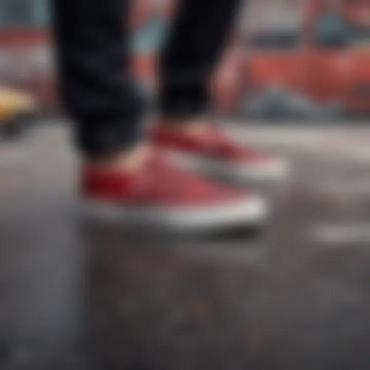 User's feet in red and black checkered Vans slip-ons resting on a skateboard with graffiti background.