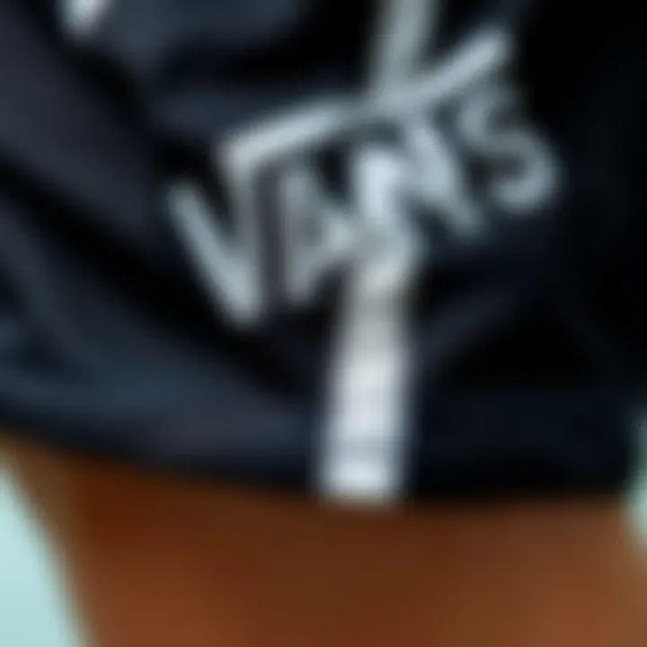 Fabric Detail of Vans Black Primary Volley Shorts Close-up view of Vans Black Primary Volley Shorts showcasing fabric texture and design.