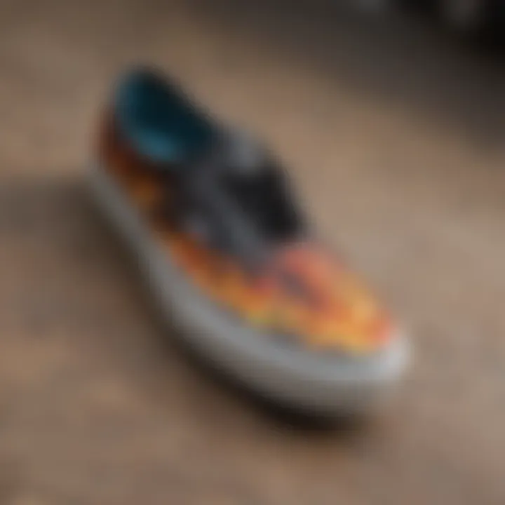 Close-up of flame-patterned vans on a skateboard deck