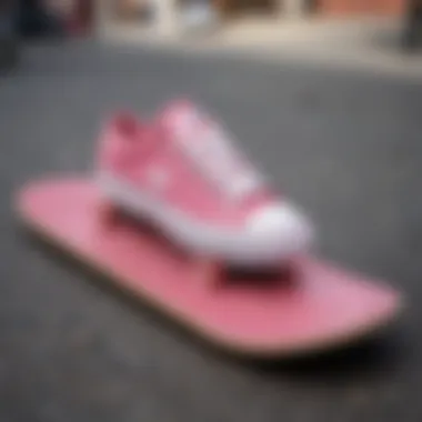 A close-up of the Pink Allstar on a skateboard deck