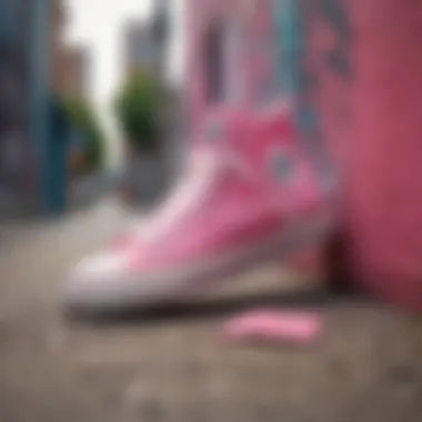 A vibrant Pink Allstar sneaker against a graffiti backdrop