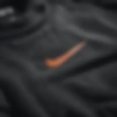 Detailed view of the Nike Sportswear Club Fleece Sweatshirt's stitching and design elements