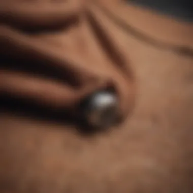 Close-up of a textured brown hooded sweatshirt hanging on a skateboard