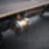 Close-up view of an electric skateboard motor mounted on a truck