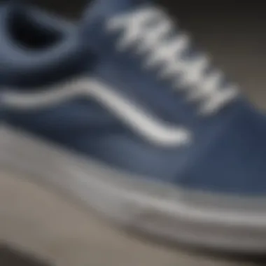 Close-up of the Vans Old Skool V Navy detailing, highlighting its premium materials